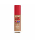 Base per Trucco Fluida Rimmel London Lasting Finish Nº 303 Honey Spf 20 30 ml